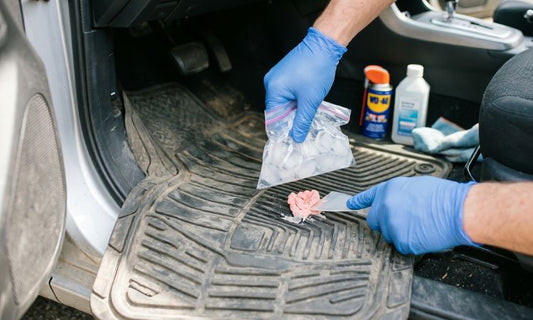 Removing gum from a car floor mat
