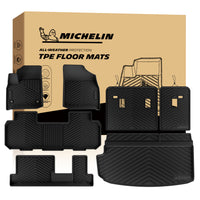 MICHELIN premium black all-weather TPE custom-fit car floor mats and integrated cargo liner set exclusively designed for 2018-2023 Chevy Traverse 8-seat models. Includes front, 2nd-row bench, and 3rd-row mats, plus a trunk mat with seat back protectors, utilizing high-density TPE for complete waterproof interior coverage.