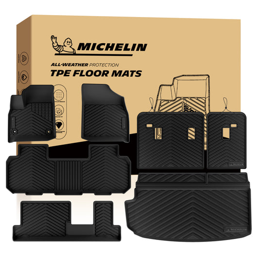 MICHELIN premium black all-weather TPE custom-fit car floor mats and integrated cargo liner set exclusively designed for 2018-2023 Chevy Traverse 8-seat models. Includes front, 2nd-row bench, and 3rd-row mats, plus a trunk mat with seat back protectors, utilizing high-density TPE for complete waterproof interior coverage.