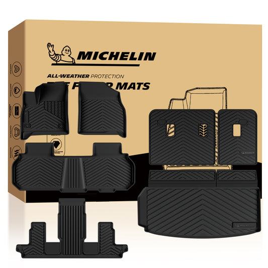 MICHELIN premium black all-weather TPE custom-fit floor mat and cargo liner set for 2024-2026 GMC Acadia, Chevy Traverse, and 2025-2026 Buick Enclave 7-seat models with captain chairs. Includes front, 2nd, and 3rd-row mats, plus a trunk liner with seat back protectors for complete 3-row interior coverage.