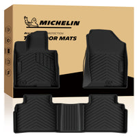 A MICHELIN brand 3-piece set of black rubber all-weather custom-fit vehicle floor mats, including driver, front passenger, and one-piece rear mats, featuring high-density rubber construction, a non-slip surface texture, and precision design for a perfect fit to specific vehicle models, offering water and dirt protection.