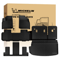 MICHELIN premium black all-weather TPE custom-fit car floor mats, trunk cargo liner, and seat back protector set exclusively designed for 2018-2023 Chevy Traverse and 2024 Traverse Limited 7-seat models. Includes 1st, 2nd, and 3rd-row mats, along with split rear seat backrest protectors featuring precise cutout details, and a main trunk mat, utilizing high-density TPE for complete waterproof interior coverage.