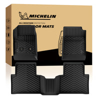 Full set Michelin all-weather floor mats displayed alongside official product packaging.