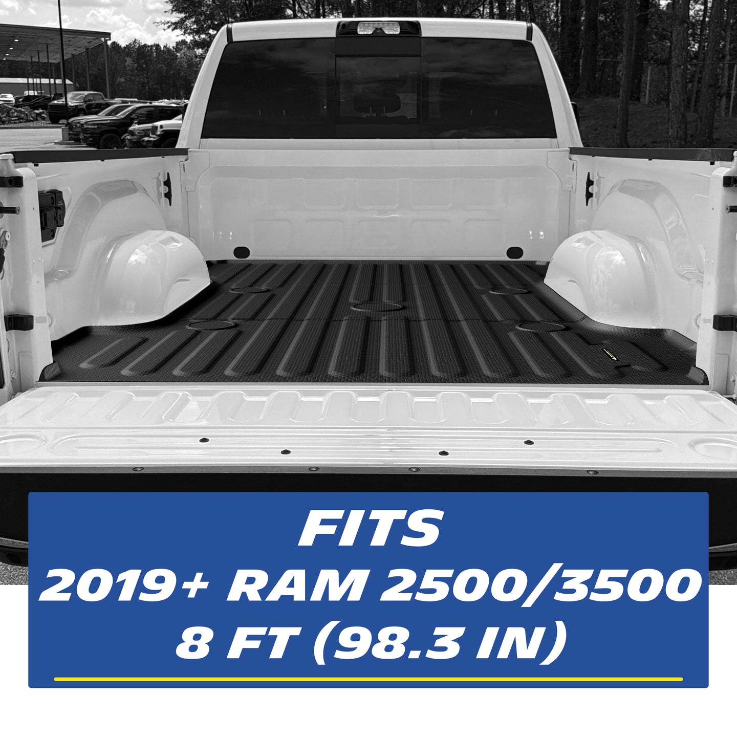 Real-world installation of a custom-fit black TPE heavy-duty truck bed mat inside a white 2019-2026 Ram 2500/3500 8 FT (98.3 in) bed. The image demonstrates the precise edge-to-edge fitment perfectly contouring the cargo space for comprehensive seamless protection.