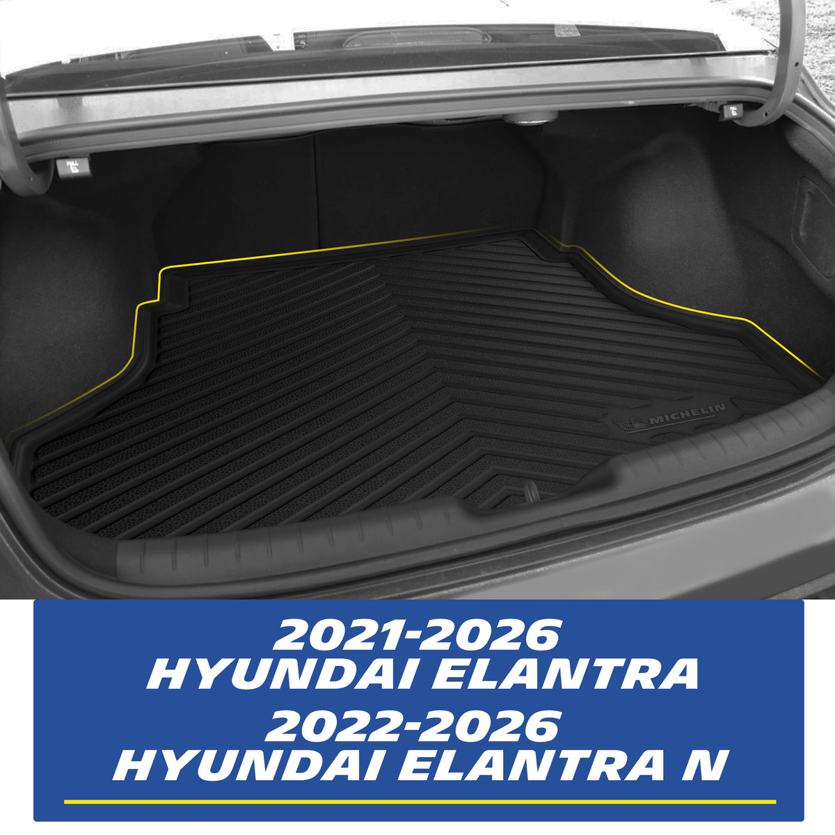 Real-world installation of a custom-fit MICHELIN black TPE rear trunk cargo mat inside a 2021-2026 Hyundai Elantra / 2022-2026 Elantra N. The image demonstrates the precise edge-to-edge fitment perfectly contouring the trunk space for comprehensive waterproof and dirt protection during daily cargo loading.