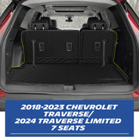 Real-world installation of the custom-fit MICHELIN black TPE rear trunk cargo mat and seat back protectors inside a 2018-2023 Chevrolet Traverse / 2024 Traverse Limited 7-seater. Demonstrates precise edge-to-edge fitment perfectly accommodating the 3rd-row seats for comprehensive waterproof cargo protection.