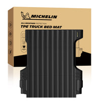 Michelin Colorado Canyon 5FT 2015-2022 truck bed mat displayed in front of branded packaging box