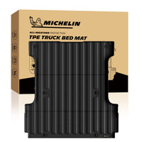 Michelin Ford F150 5.5 FT truck bed mat placed in front of retail packaging box product display