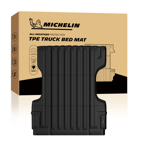 Michelin Nissan Frontier 6 FT 2005-2021 truck bed mat shown in front of branded retail packaging box
