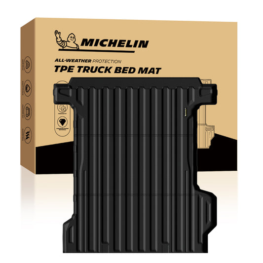 Michelin Silverado EV standard bed 2024-2026 truck bed mat positioned in front of branded retail box packaging
