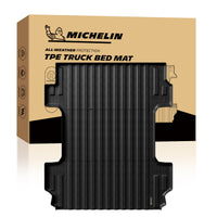 Michelin Silverado Sierra 1500 6.6FT 2019-2026 truck bed mat placed in front of branded retail packaging box